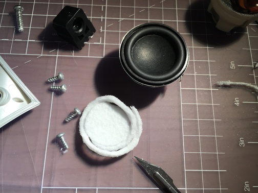 Cutting the gasket for the new driver out of an IKEA FIXA floor protector.